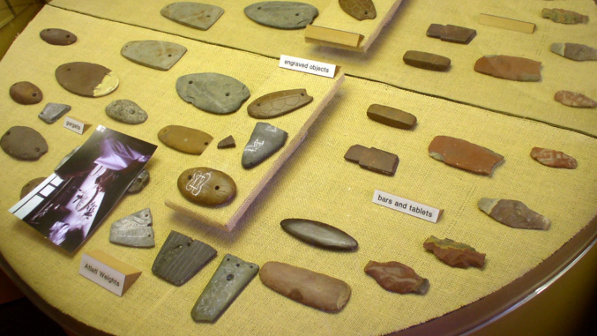 File:Poverty Point gorgets atlatl weights HRoe 2009.jpg