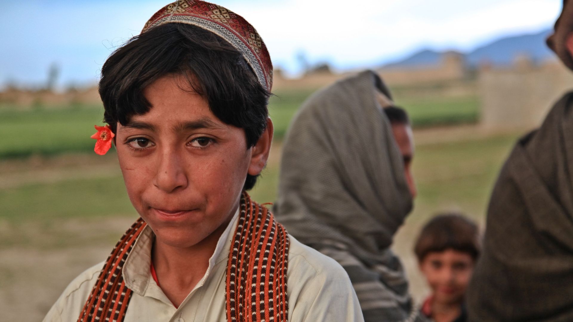File:Afghan Pashtun boy with traditional hat and scarf.jpg