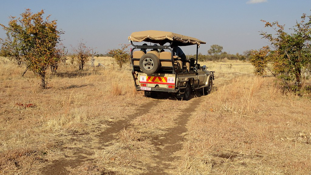 Photo of Safari Vehicle with Tourists in Hwange National Park, Zimbabwe