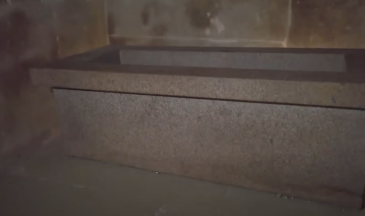 A Red Granite Offering Table