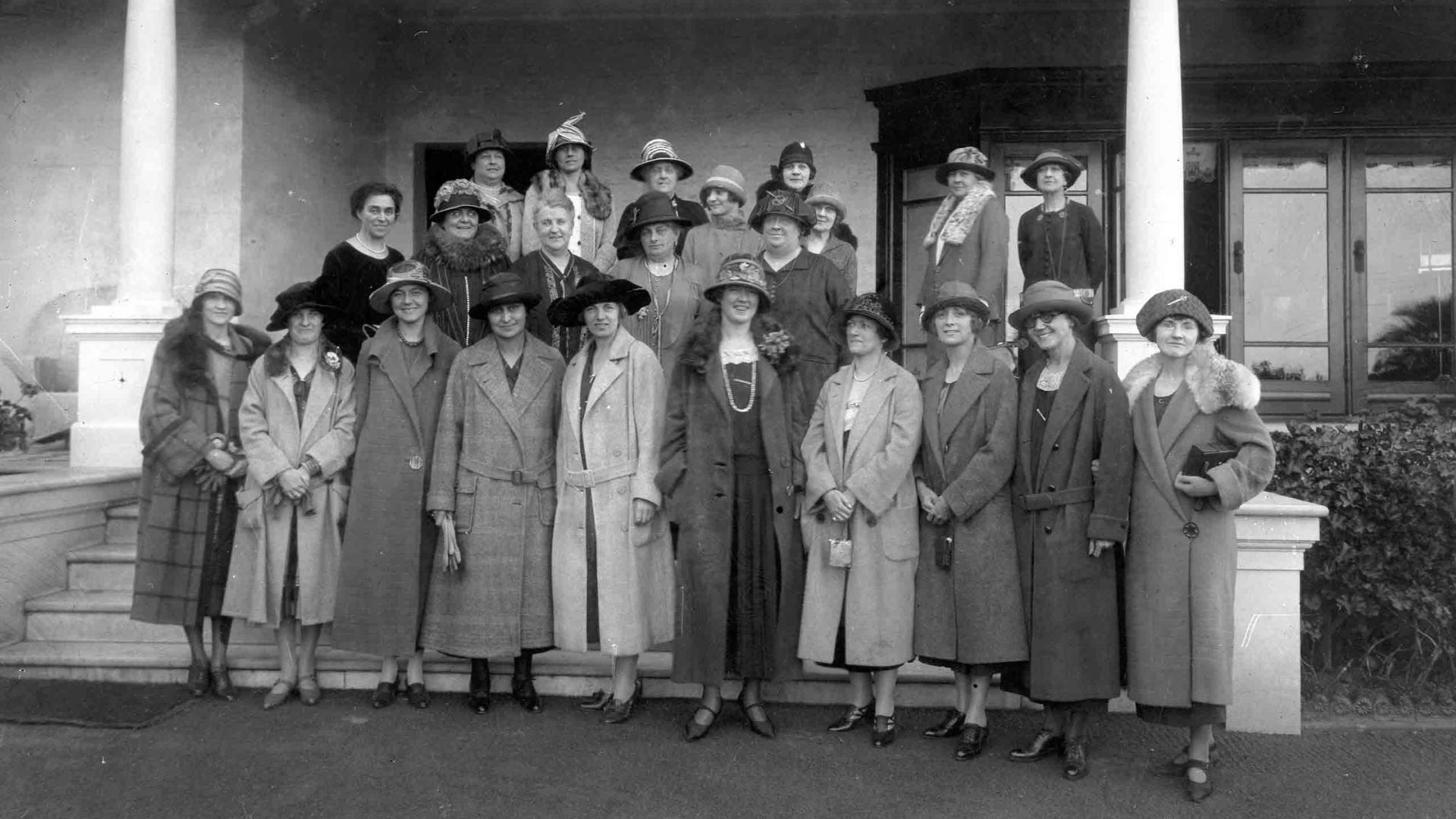 File:Group portrait of women posing near the entrance of a house, c 1925 (7994873803).jpg