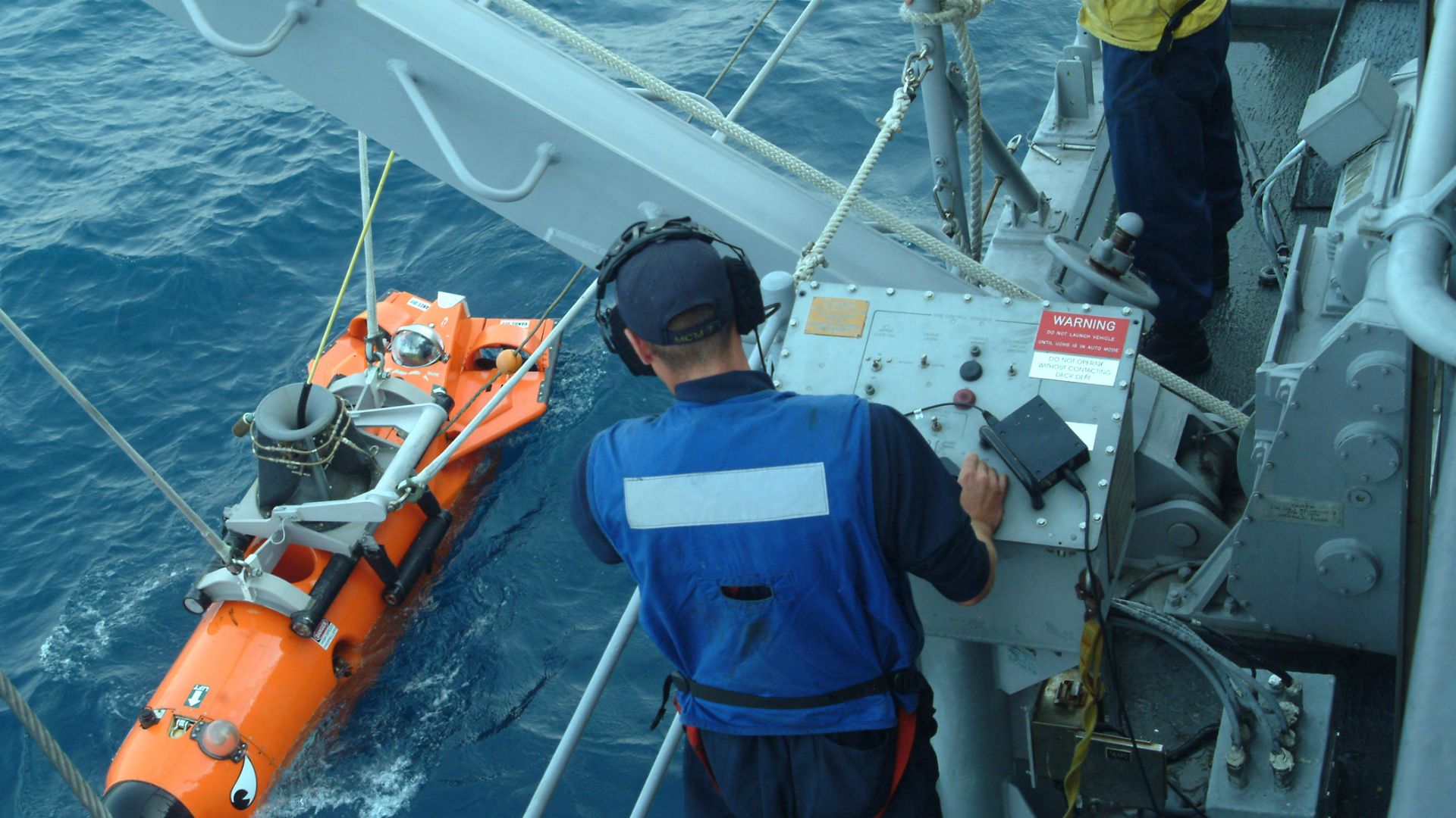 File:US Navy 060612-N-4124C-065 Mineman 3rd Class Dustin Moore, assigned to the mine warfare ship USS Patriot (MCM 7), retrieves a mine neutralization vehicle (MNV) after the device conducted an underwater water mine survey.jpg