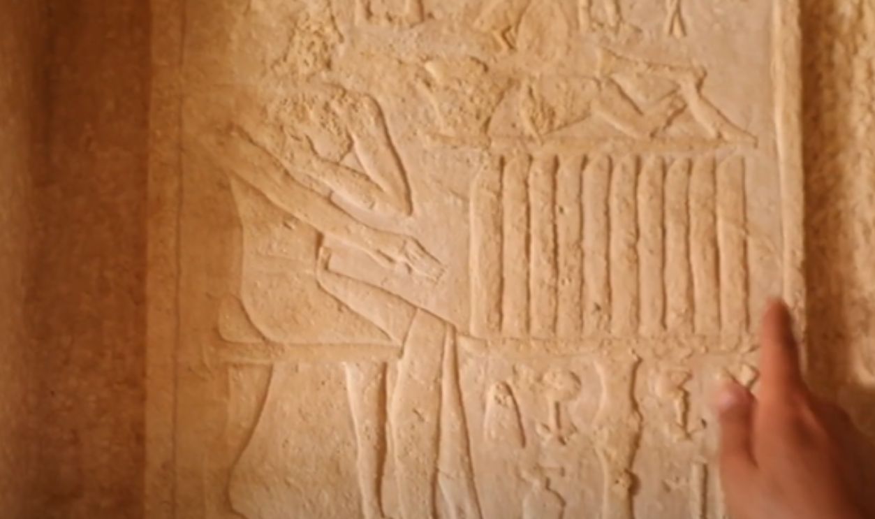 Figurines In A Wall Niche