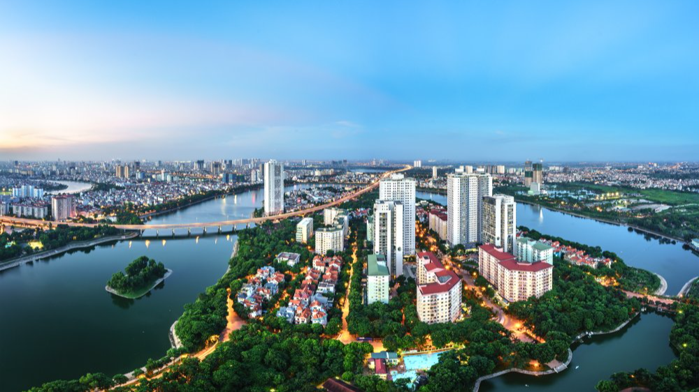 The image showcases a Vibrant urban scene of Hanoi, Vietnam