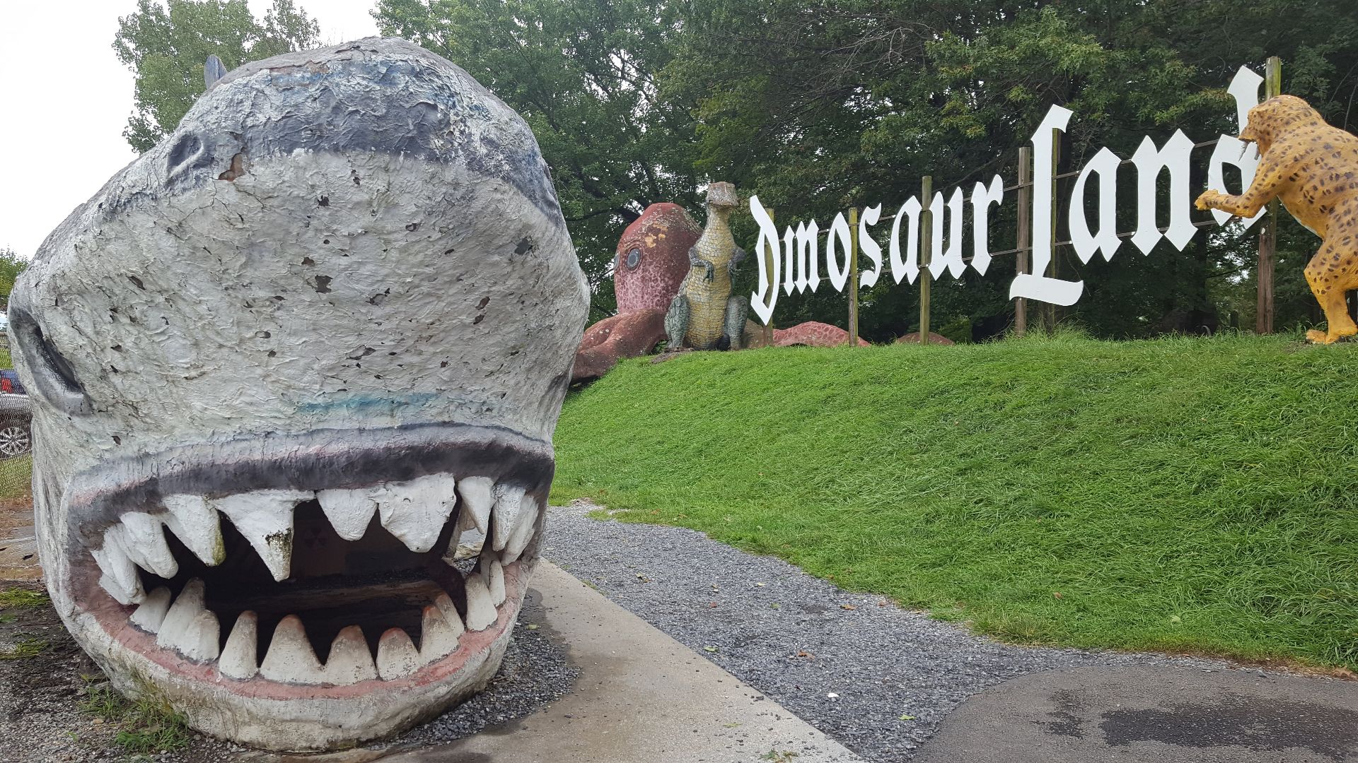 File:Dinosaur Land sign.jpg