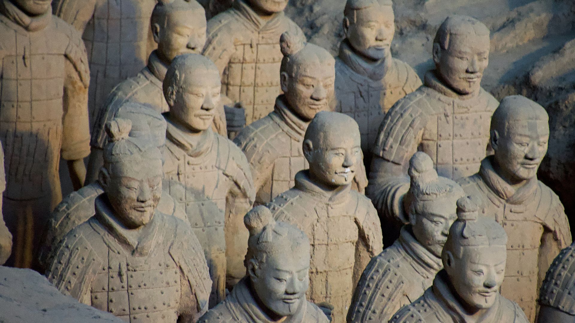 Terracotta army soldiers stand at attention.