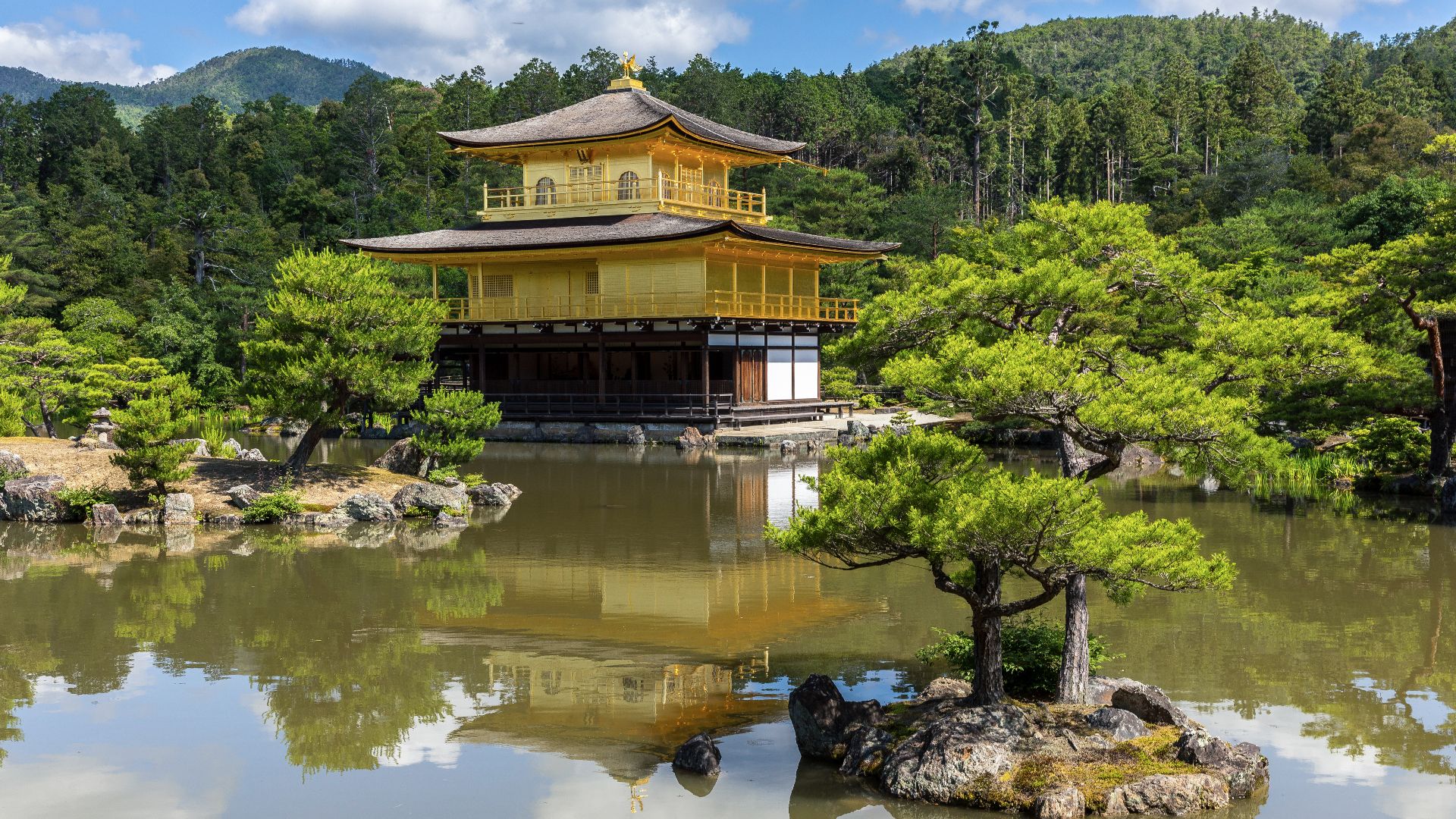 File:Water reflection of Kinkaku-ji Temple with a tree on a rock in the pond, Kyoto, Japan.jpg