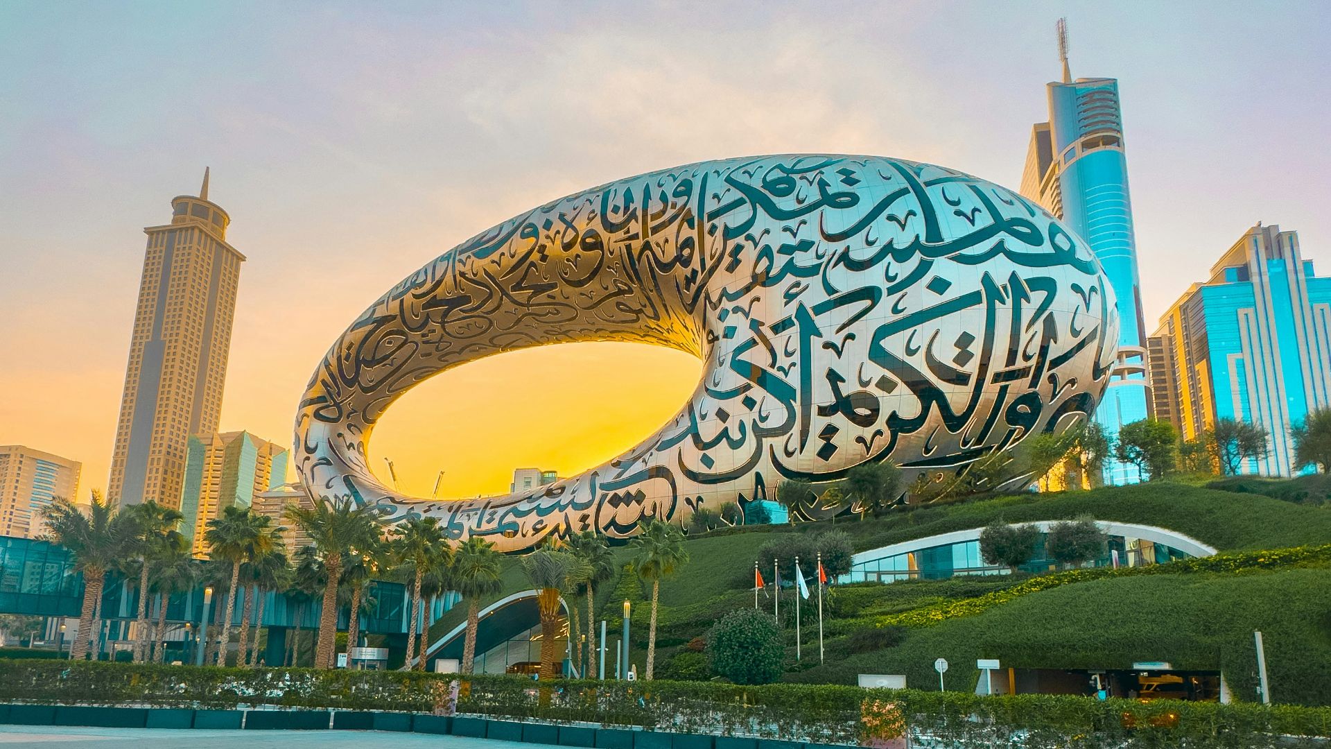 a large sculpture of a whale in front of a cityscape