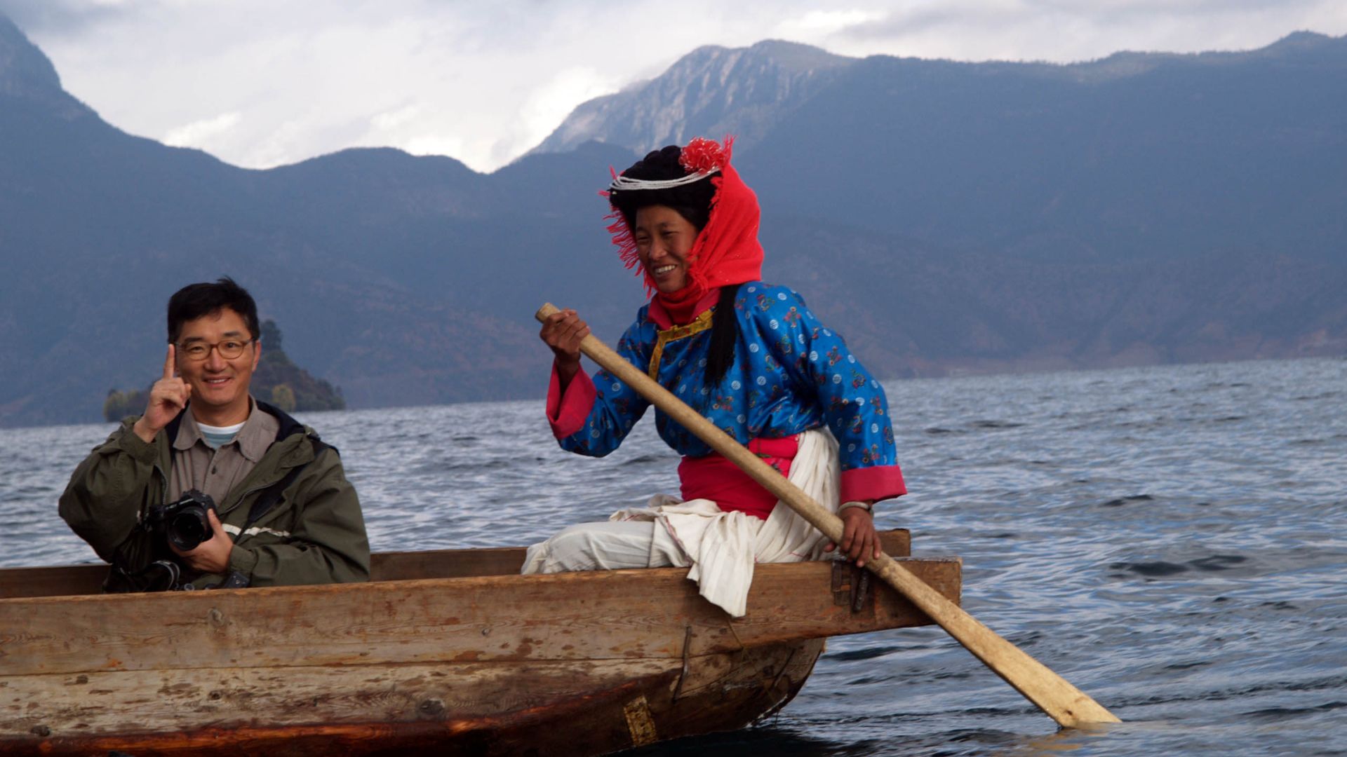 File:Lake Lugu With Moshui-Zu Woman.JPG