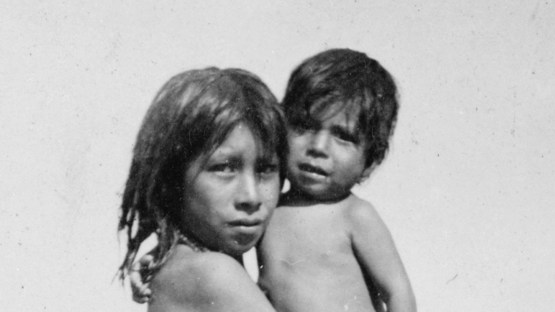 File:Nude pueblo Indian girl holding small child.jpg