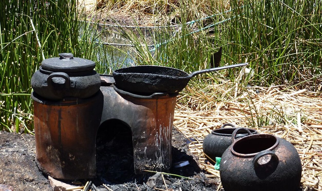 They Cook Over Fire — Carefully