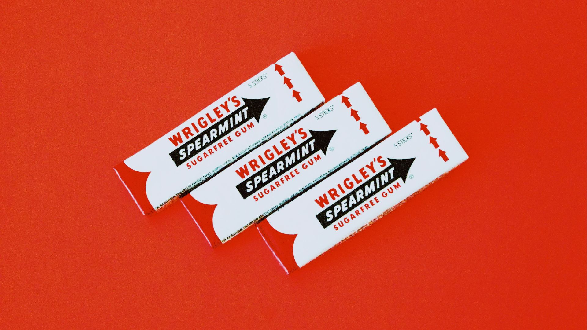 three Wrigley's spearmint gum packs