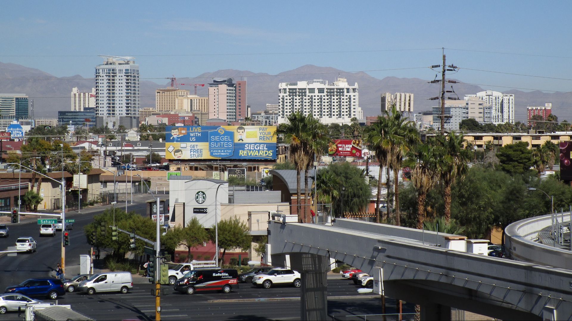 File:Nevada - Las Vegas Intersection of the Strip and Sahara Avenue - in the background the skyline of downtown Las Vegas (49541973966).jpg