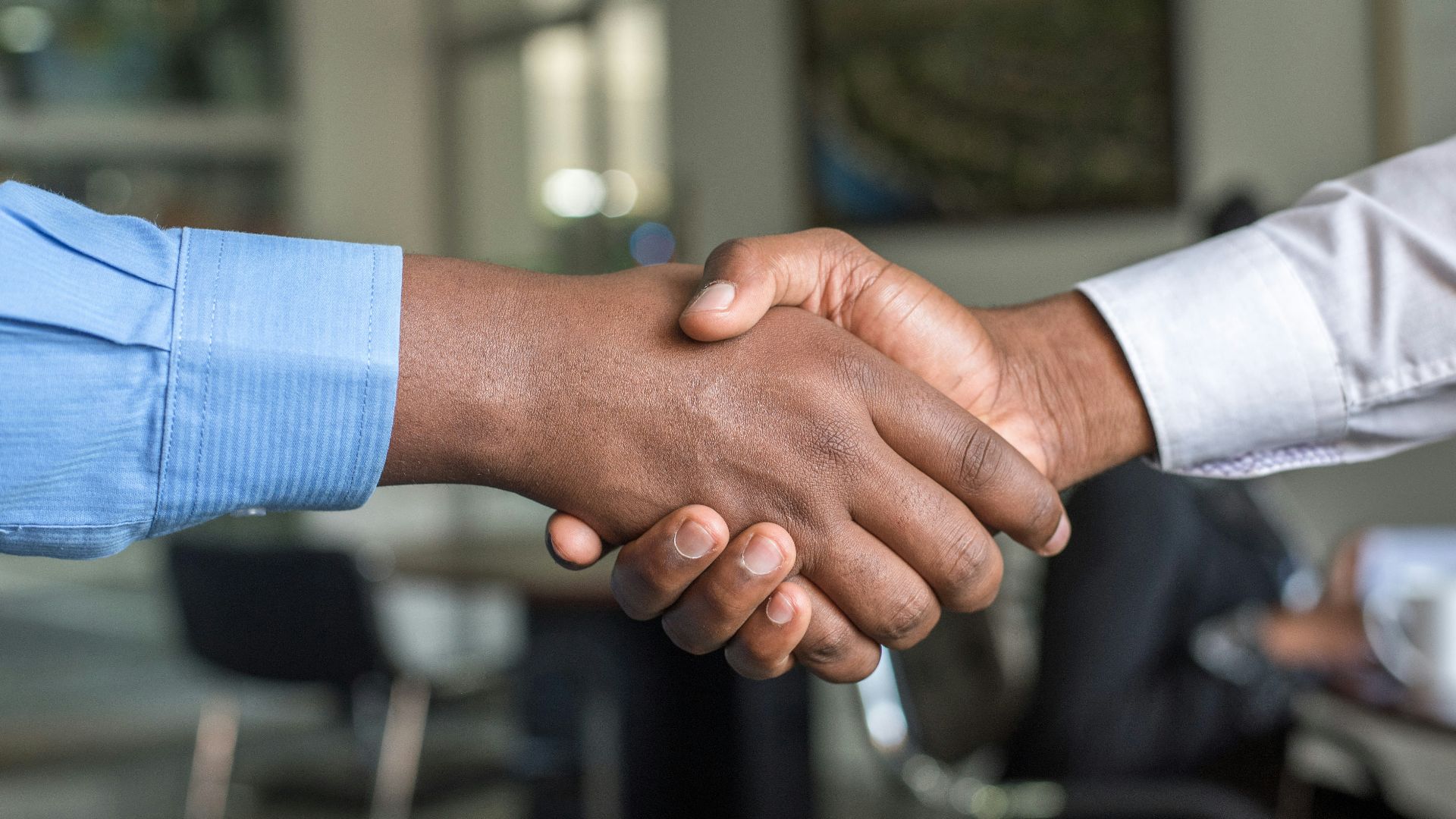 two people shaking hands