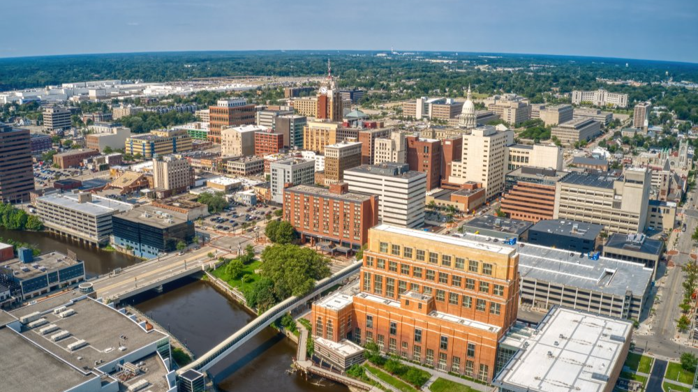 The image showcases a Vibrant urban scene of Lansing, Michigan