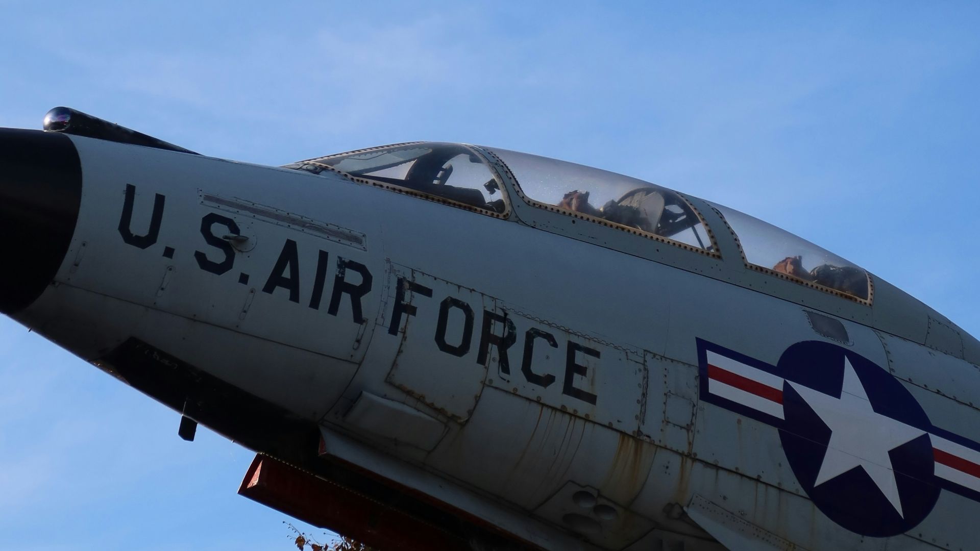 a fighter jet flying in the sky