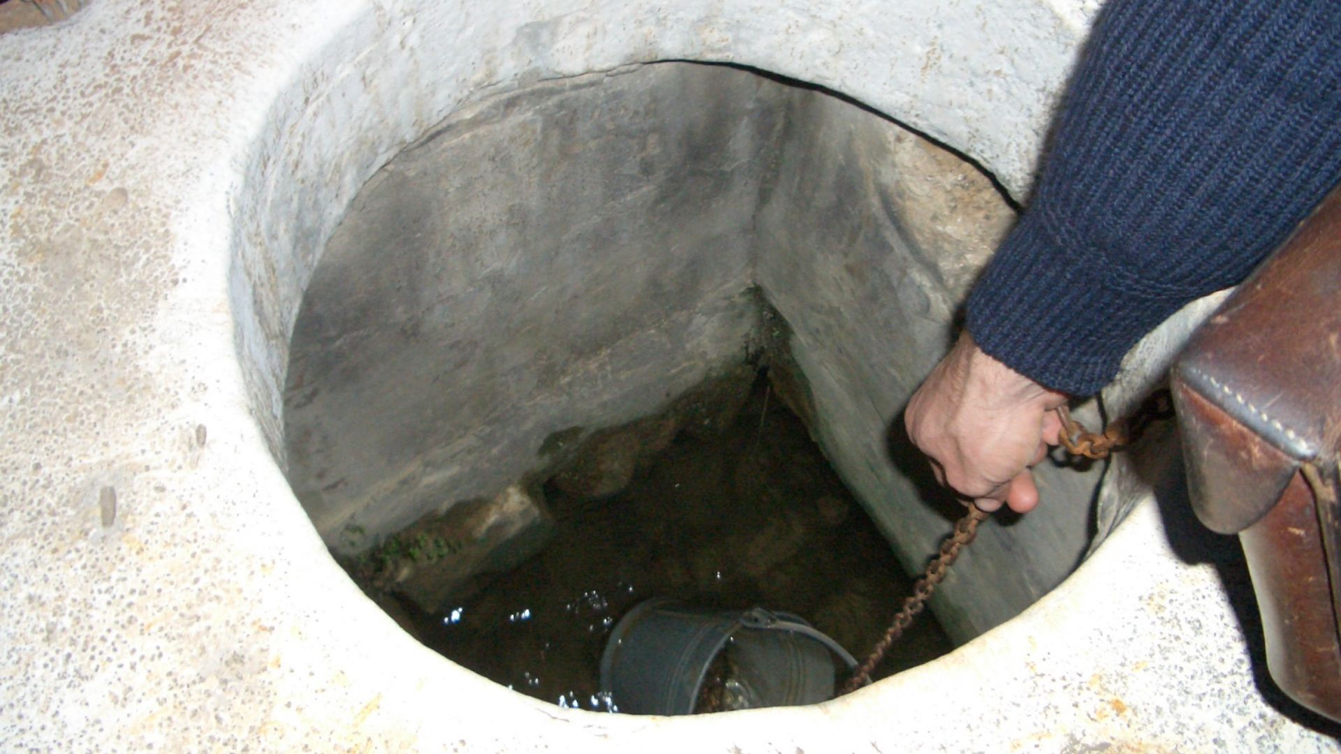 File:Cistern getting water.jpg