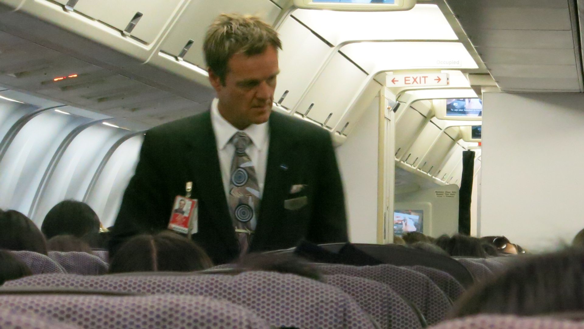 File:Qantas flight attendant.jpg