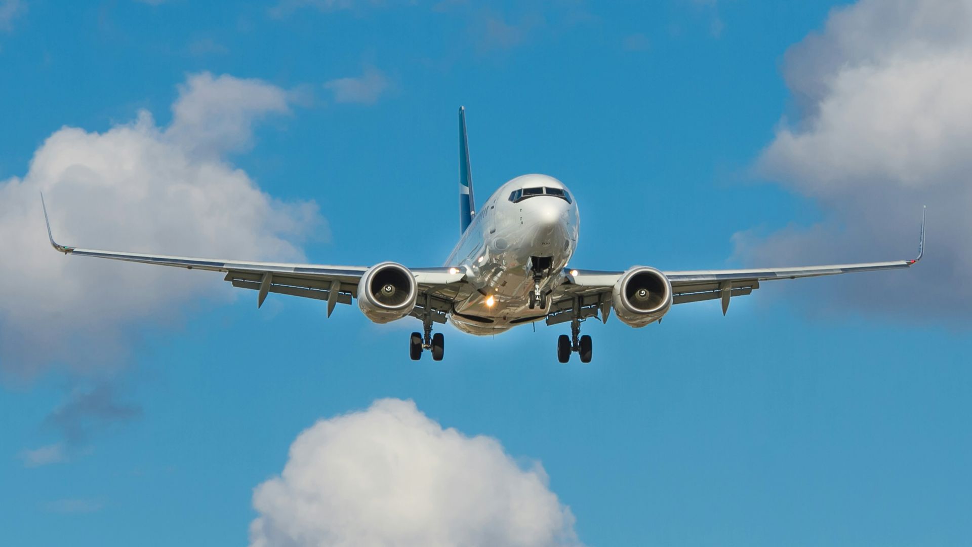 white airplane on mid air