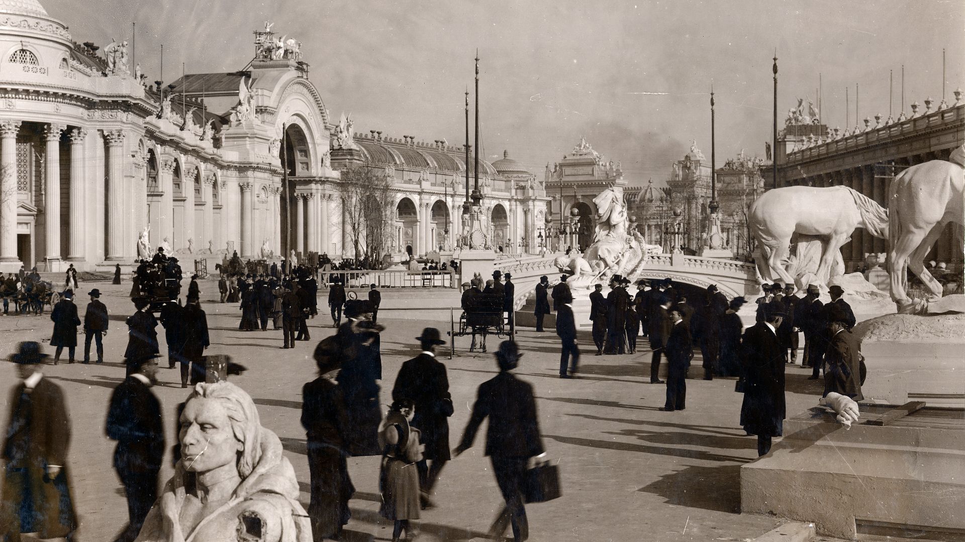 File:Crowds walking the 1904 World's Fair grounds in front of the Palace of Manufactures before the fair officially opened.jpg