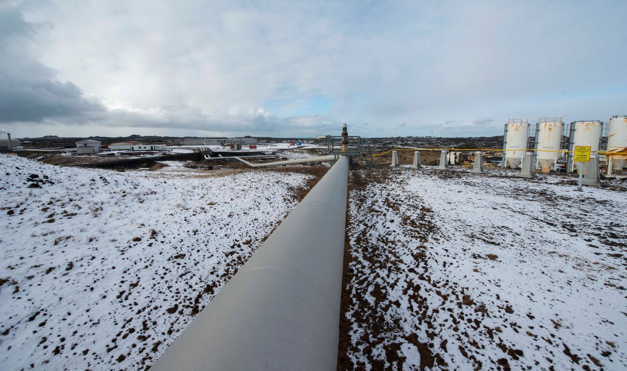 The Reykjanes geothermal power station is pictured on March 23, 2017 in Reykjanes at the southwestern tip of Iceland. - The Iceland Deep Drilling Project's rig penetrates into one of deepest and hottest pits in the world and unveils the nation's variety in producing energy that's independent from fossil fuels. 