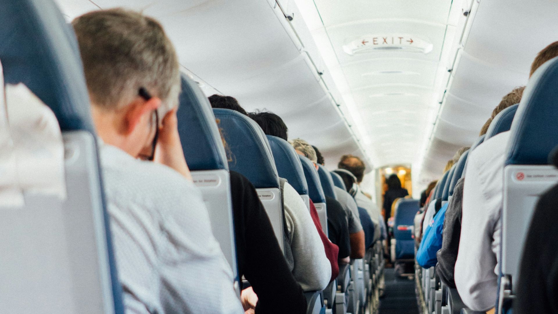 people sitting inside plane
