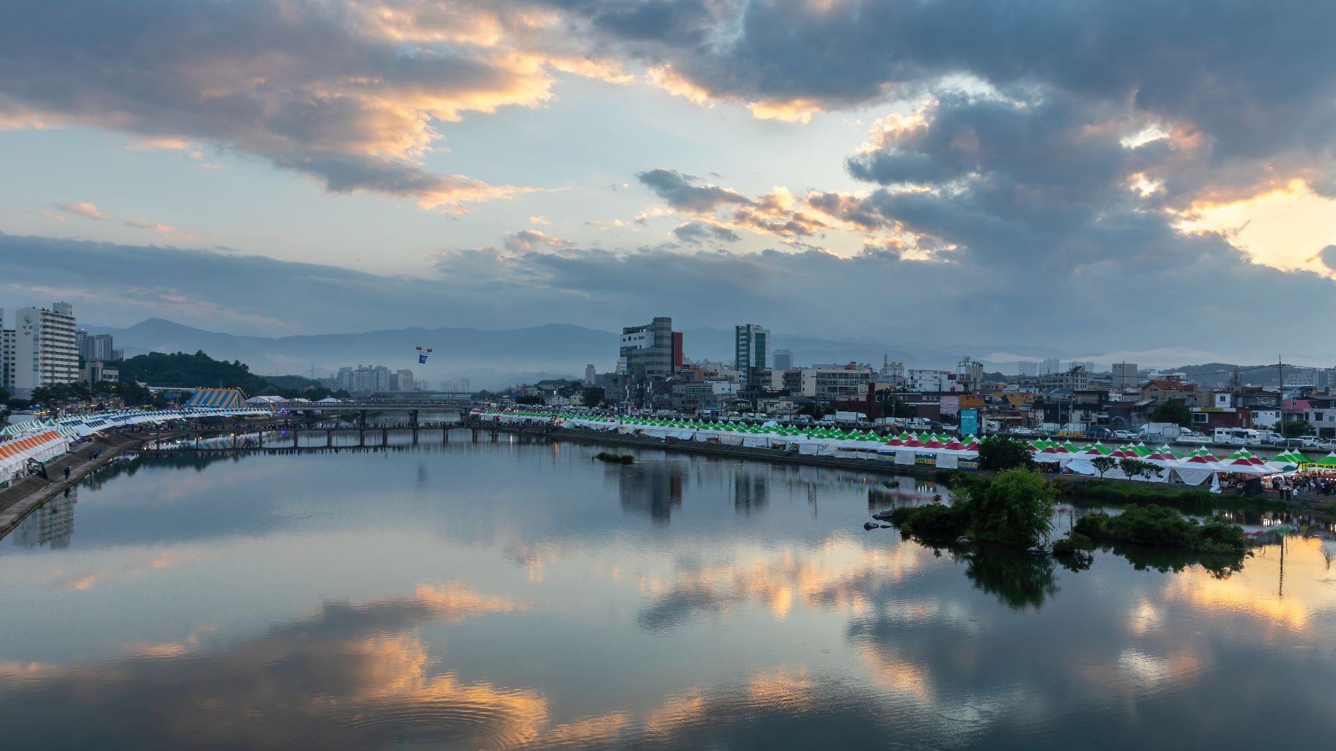 File:Namdae stream water reflection of colorful clouds from Wolhwagyo bridge in Gangneung South Korea.jpg