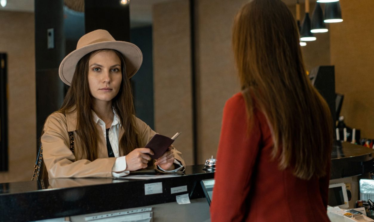 Woman at hotel reception