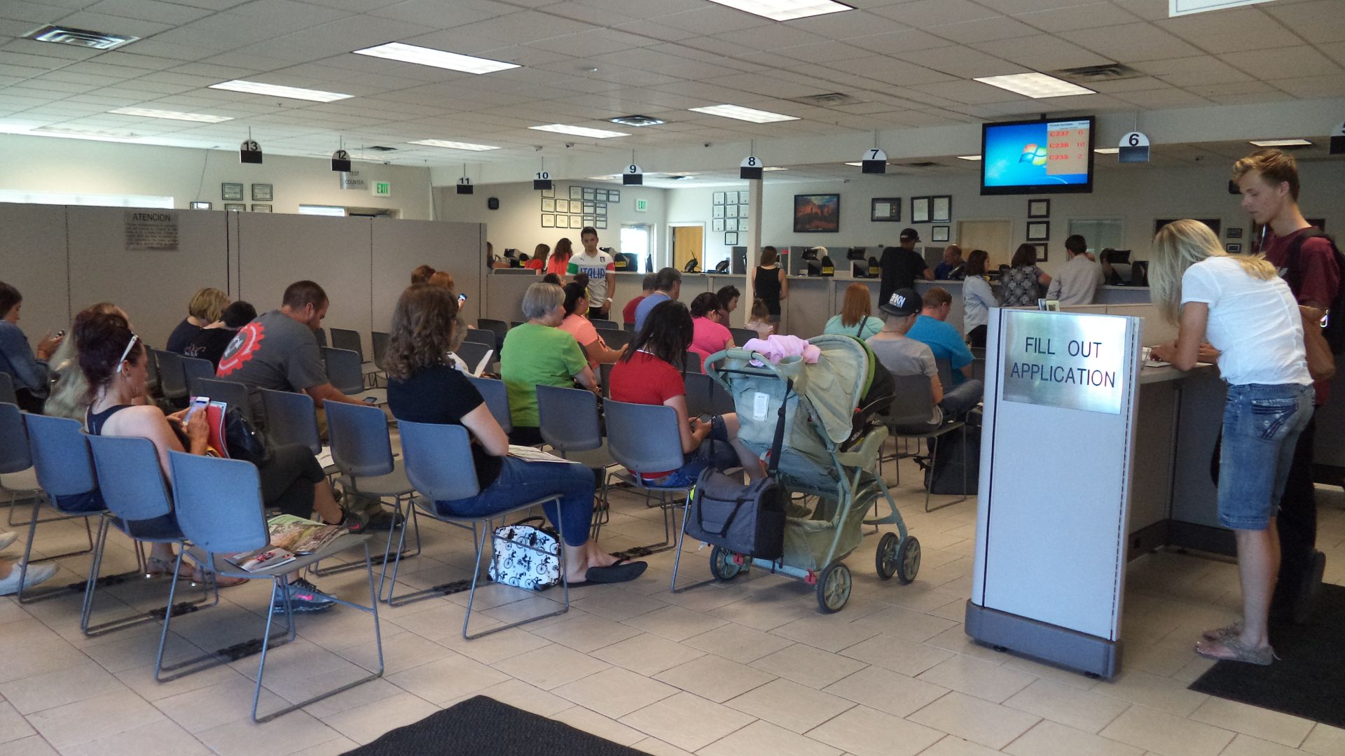 File:People waiting in line at the DMV.jpg