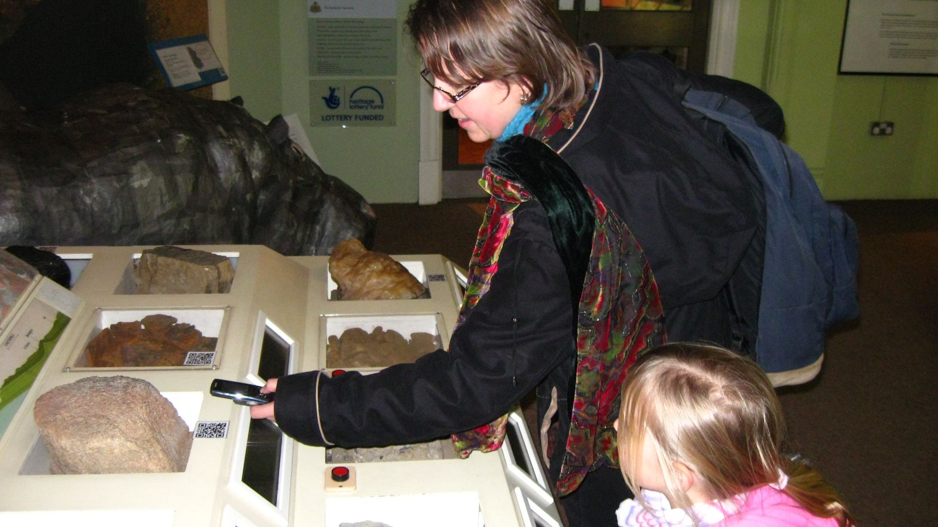 File:Derby Museum visitor uses QR Code.jpg