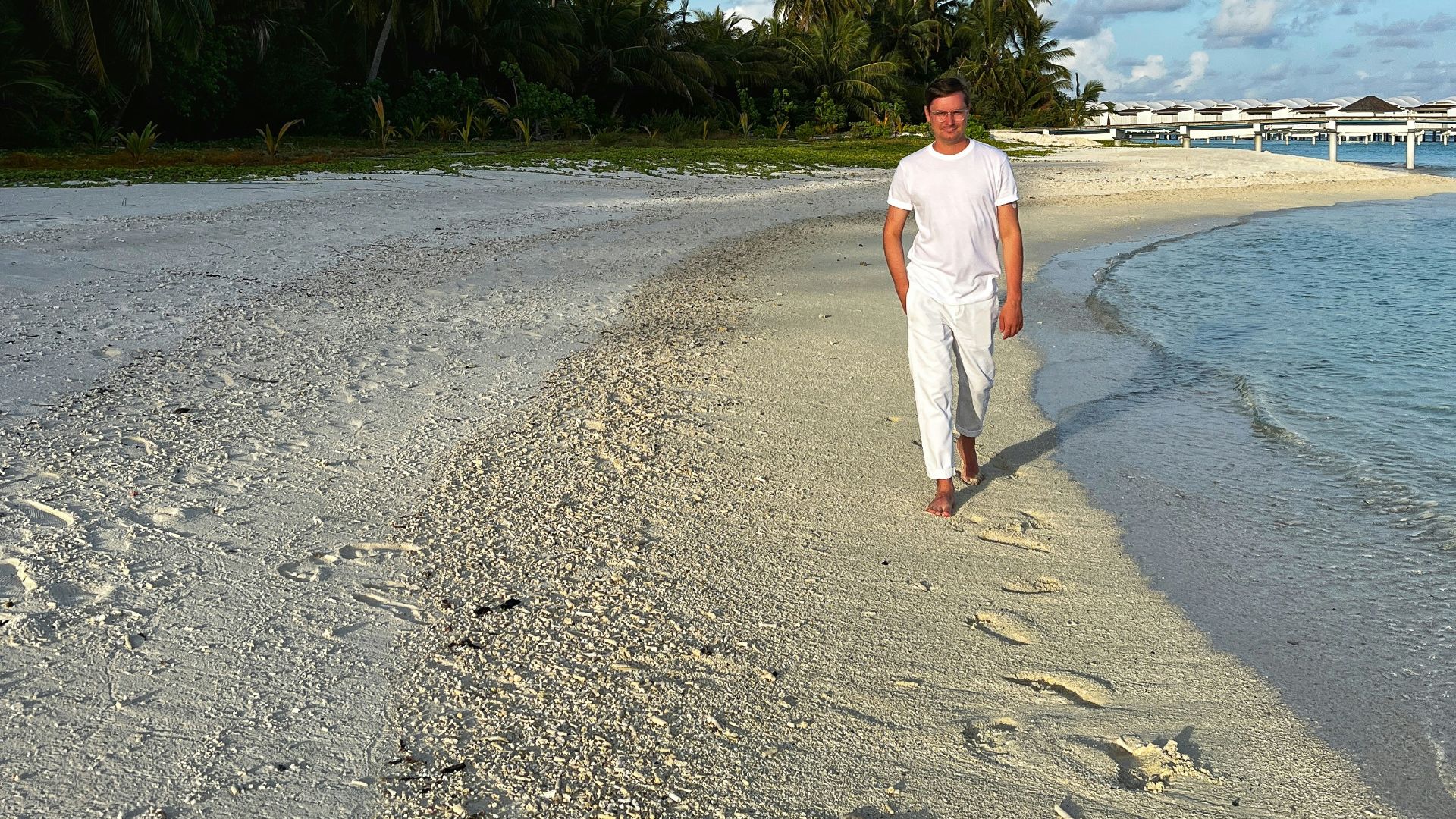 a man standing on a beach