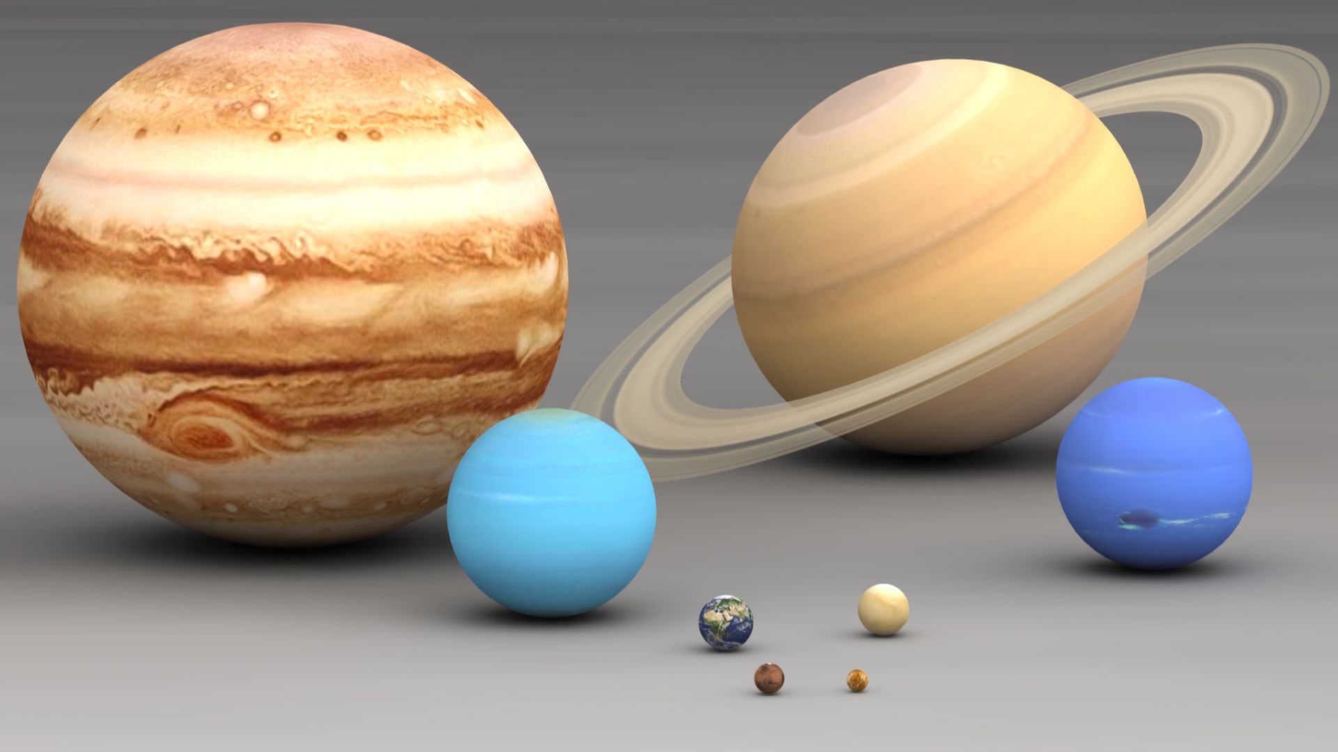 Solar system planets size comparison.Largest to smallest are pictured left to right, top to bottom:  Jupiter, Saturn, Uranus, Neptune, Earth, Venus, Mars, Mercury.