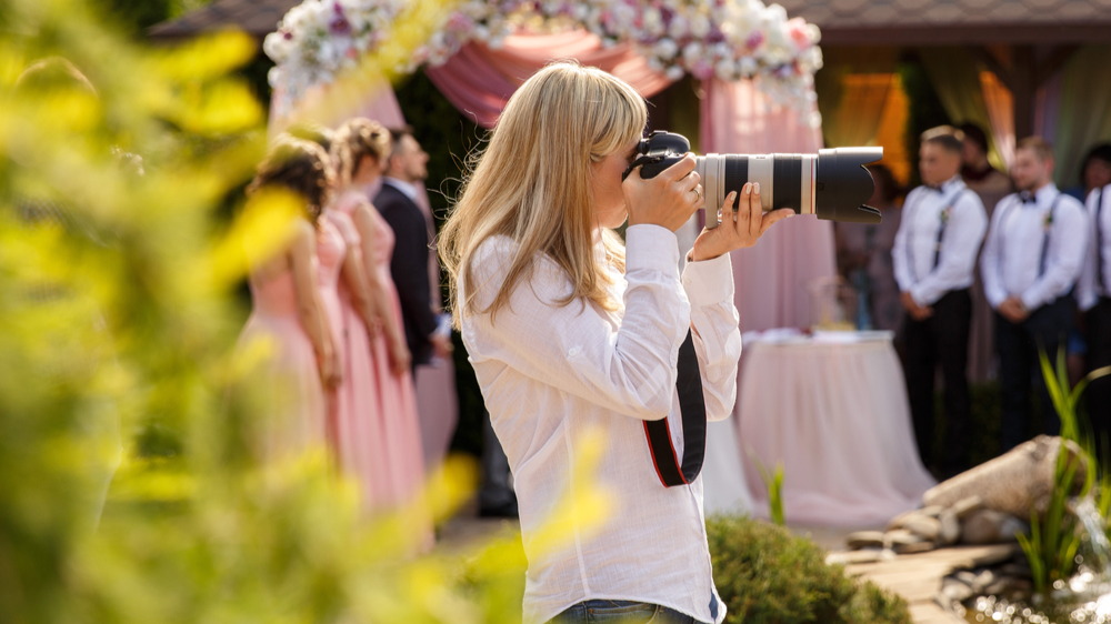 Wedding photographer with a professional camera