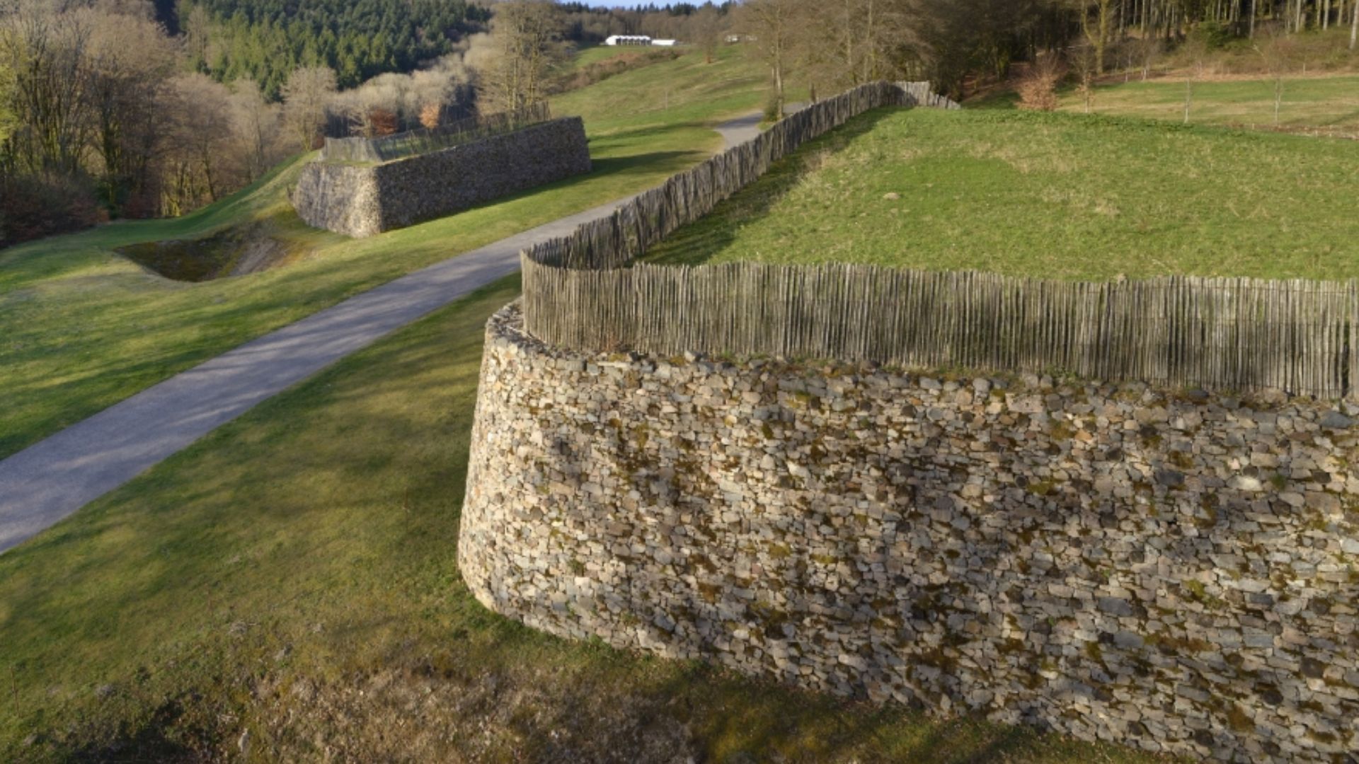 The Rebout Gate, the main access to the oppidum of Bibracte in the 1st century BC. Door and walls were rebuilt after the excavation using the murus gallicus technique. Nièvre, Morvan, Burgundy, France.