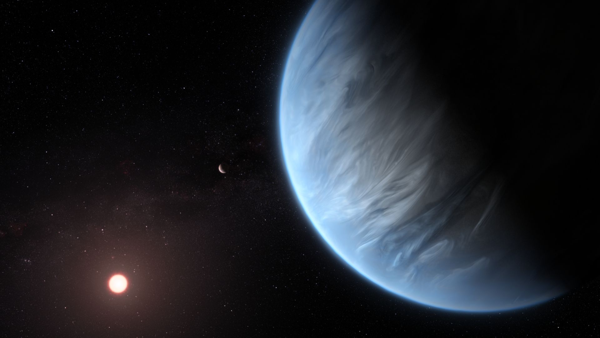 This artist's impression shows the planet K2-18b, its host star and an accompanying planet in this system. K2-18b is now the only super-Earth exoplanet known to host both water and temperatures that could support life.