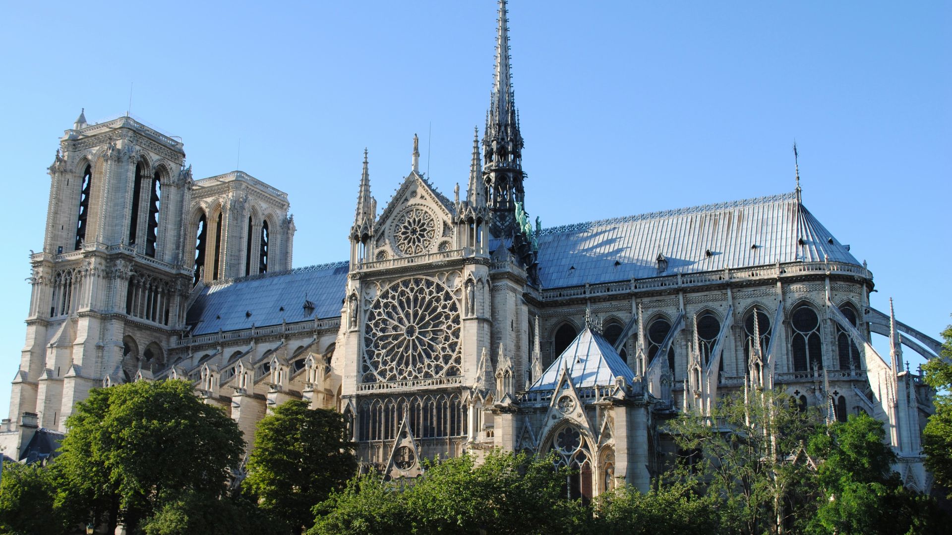 a large cathedral with a clock on the front of it