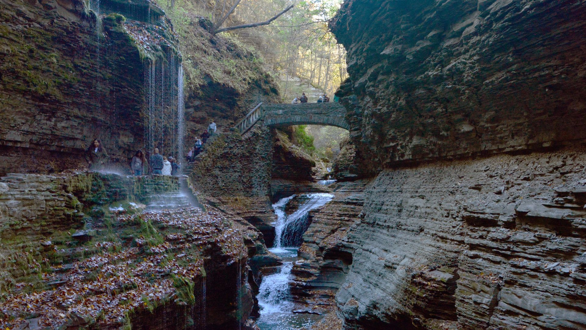 Looking up Glen Creek to Rainbow Bridge on the Gorge Trail, Watkins Glen State Park, Town of Dix, New York. Rainbow Falls is almost directly below the bridge. When headed down the trail, you cross from the north (right) bank of Glen Creek to the south (le