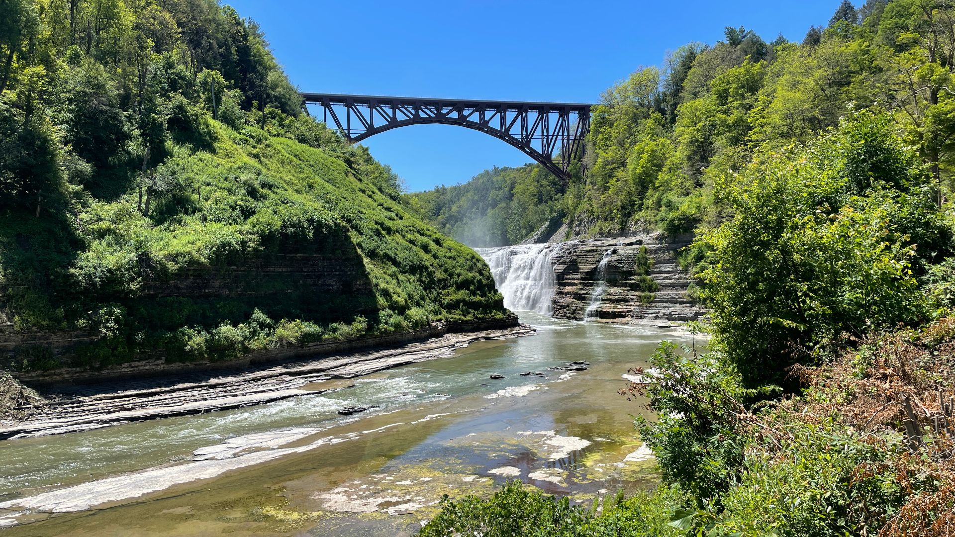 The Upper Falls and Genesee Arch Bridge along the Genesee River at Letchworth State Park near Portageville, New York