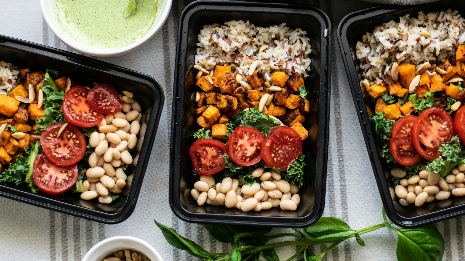 a group of trays with food