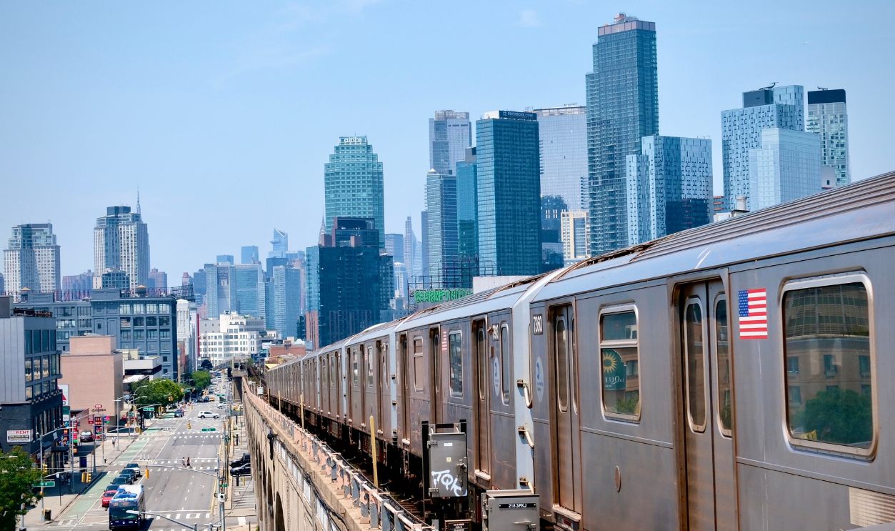 Queens, New York City, New York USA – July 7, 2025: Subway Cars Stretch Toward Manhattan