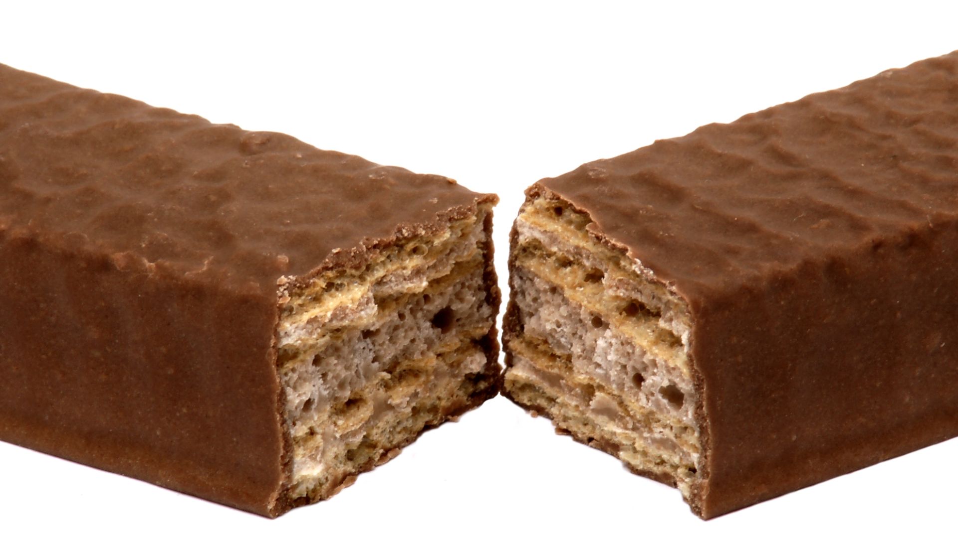 A Nestle Coffee Crisp candy bar split in half.