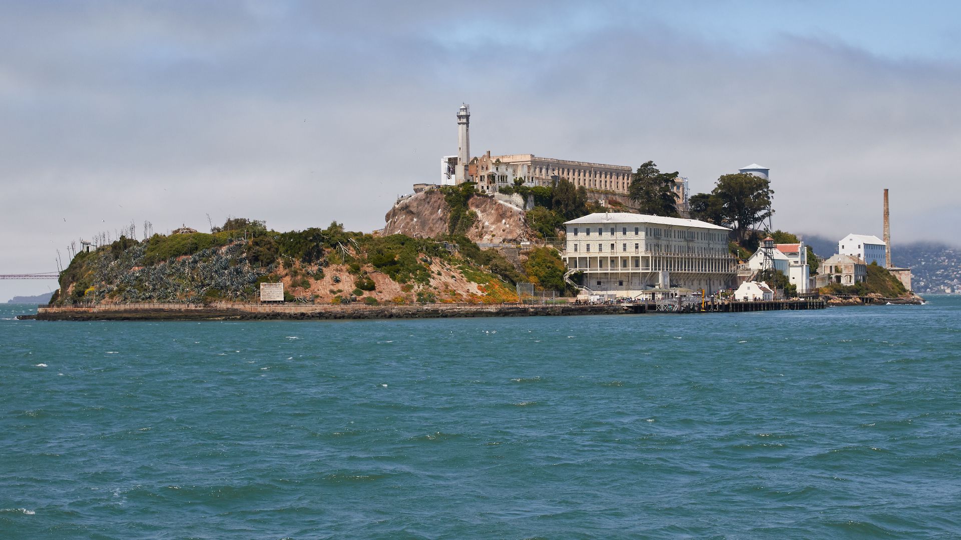 Alcatraz Island as seen from the East. The small island in the San Francisco Bay was developed with facilities for a lighthouse, a military fortification, and a prison. It received designation as a National Historic Landmark in 1986.