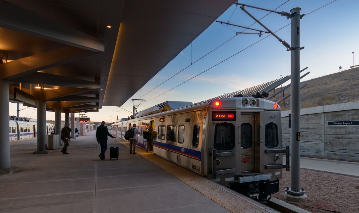 Denver, Colorado, USA - March 1, 2025 - Souls Boarding the A Line Train of Regional Transportation District (RTD) at Denver International Airport