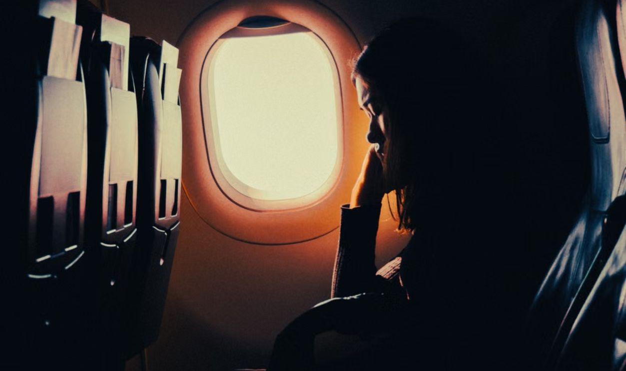Woman sleeping through flight