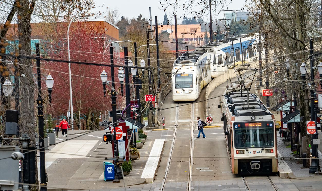 Portland, Oregon - 4-1-2021: The MAX light rail train and the city streetcar in downtown Portland Oregon
