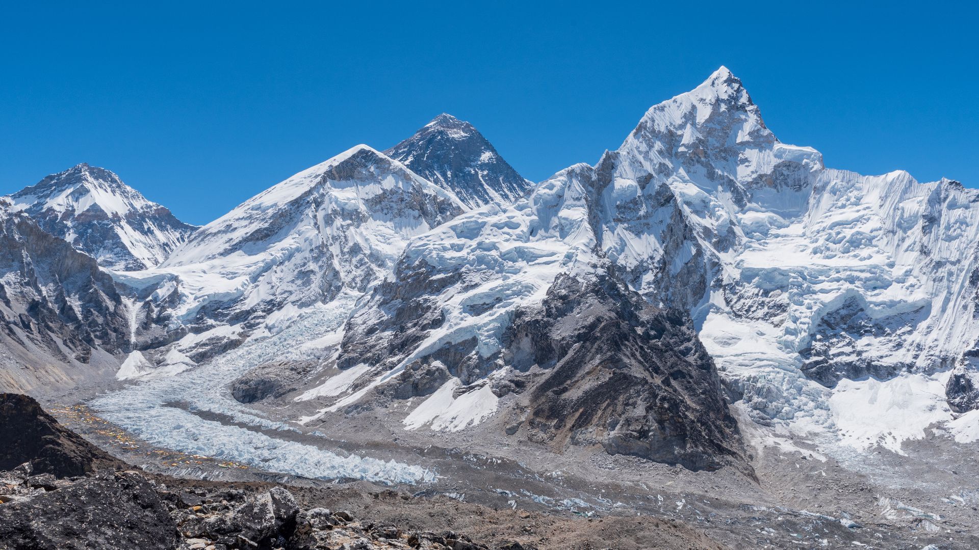 Mount Everest, known as the tallest peak on Earth, is a part of the Himalayan mountain range. Its summit reaches an impressive elevation of 8,848.86 meters (29,031.7 feet) above sea level.
It lies between China and Nepal, also known as Sagarmatha in Nepal