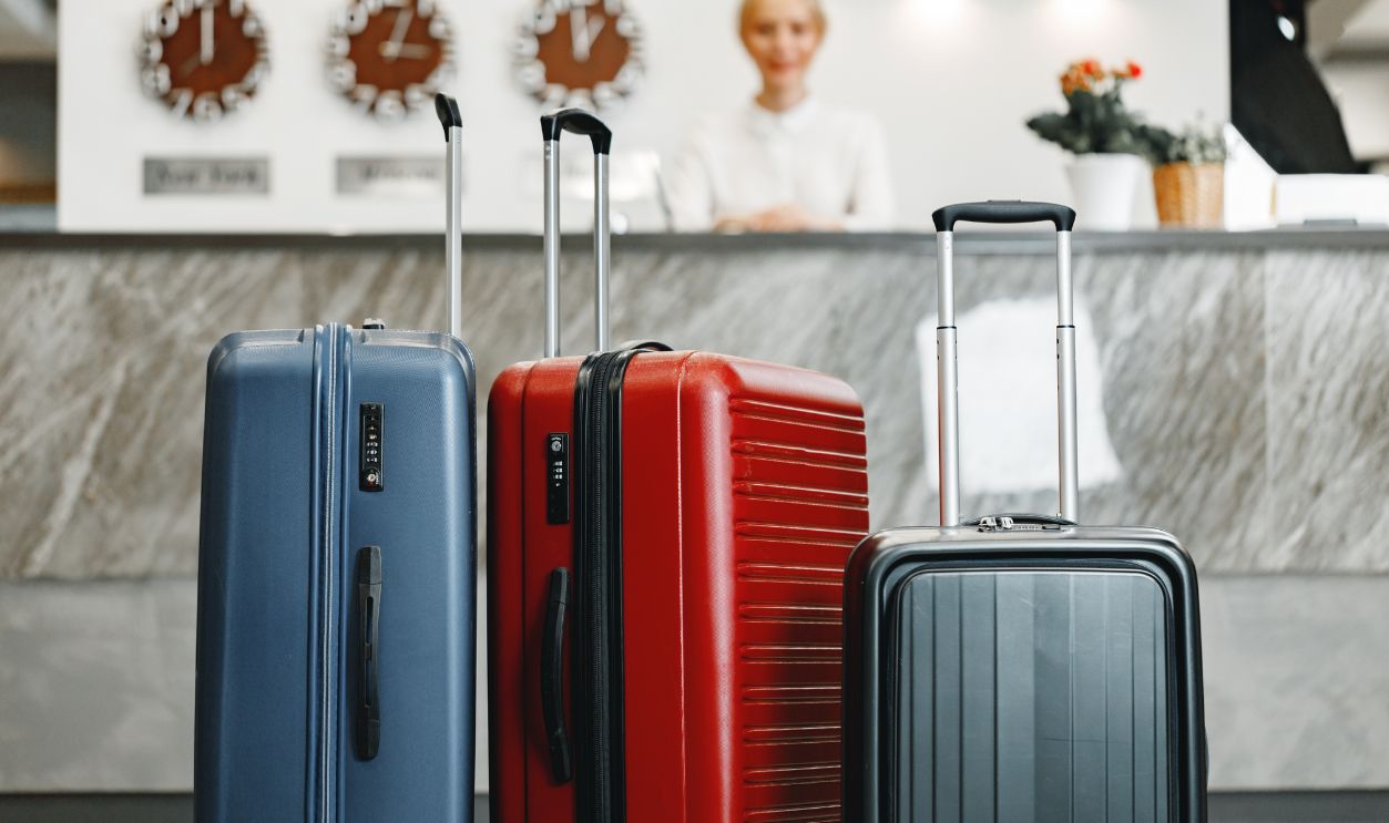 Luggage suitcase for trips standing in hotel lobby