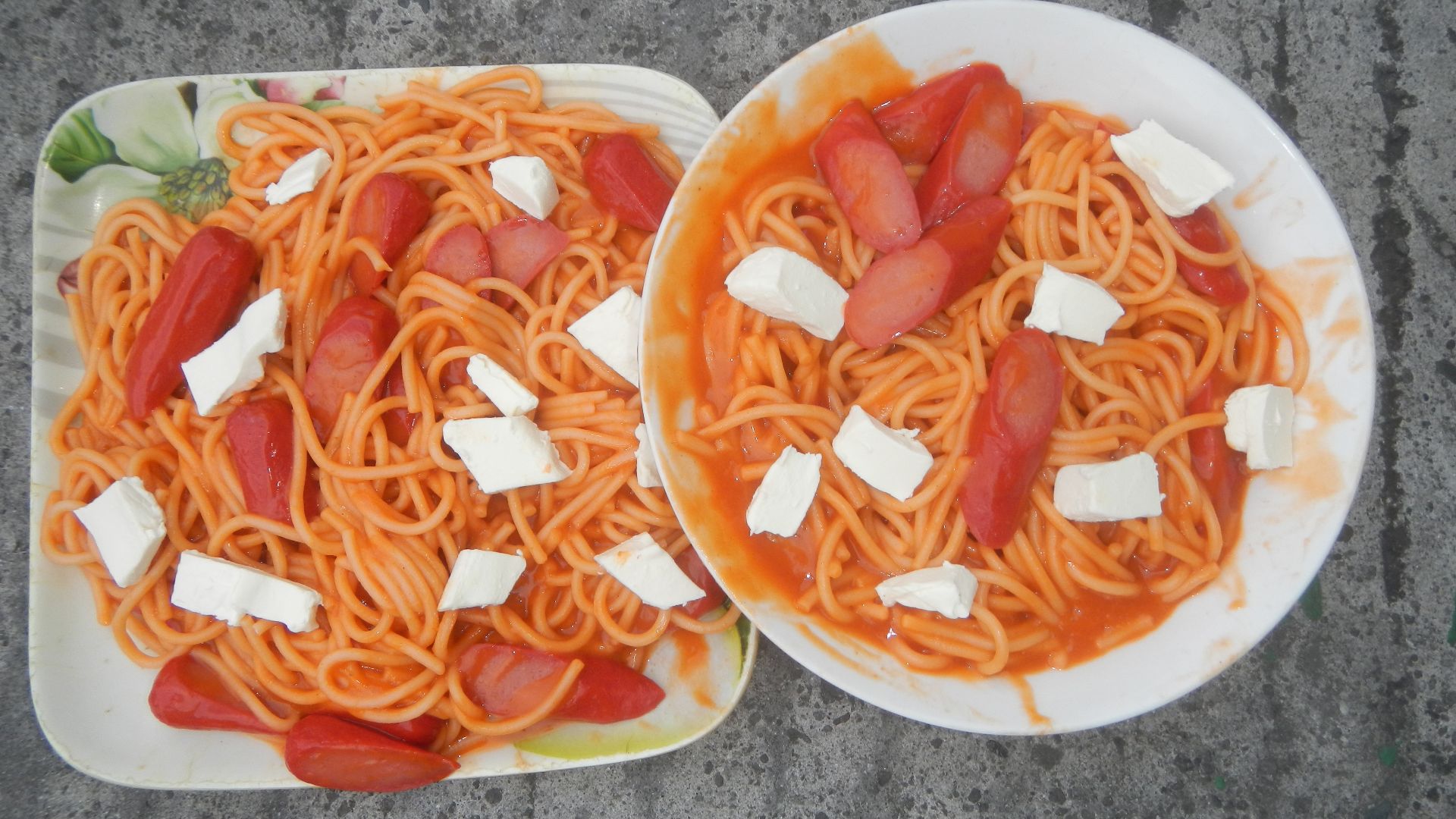 Filipino spaghetti with hot dogs and cheese