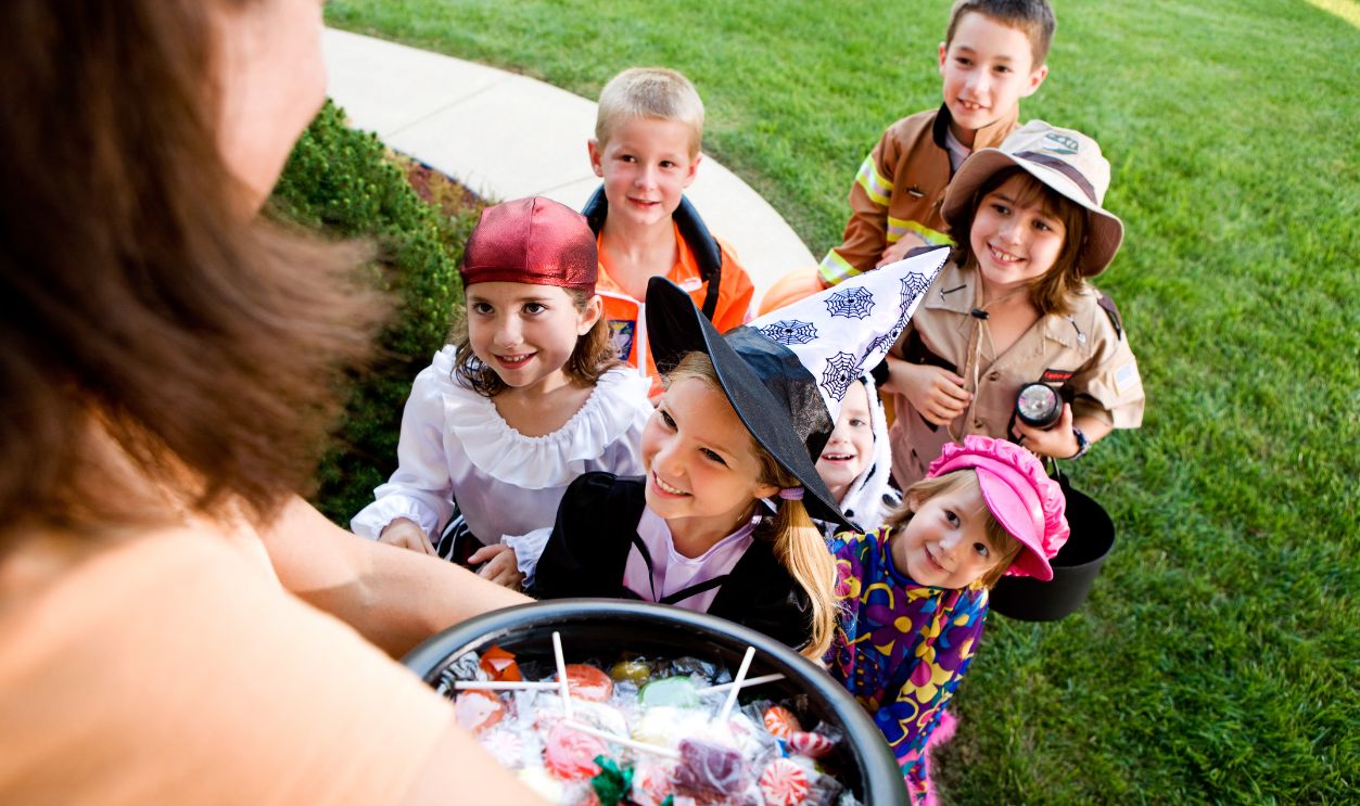 Shutterstock-210749701, Halloween: Group Of Kids Want Halloween Candy