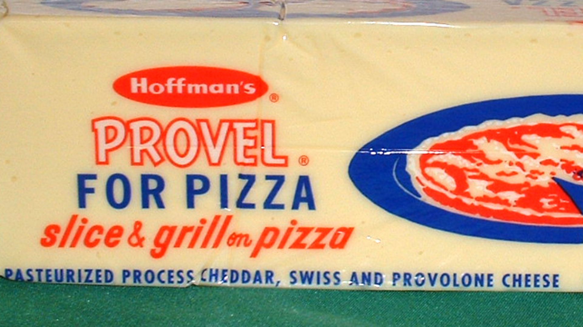 Provel pasteurized processed cheese for pizza in a 5-pound block